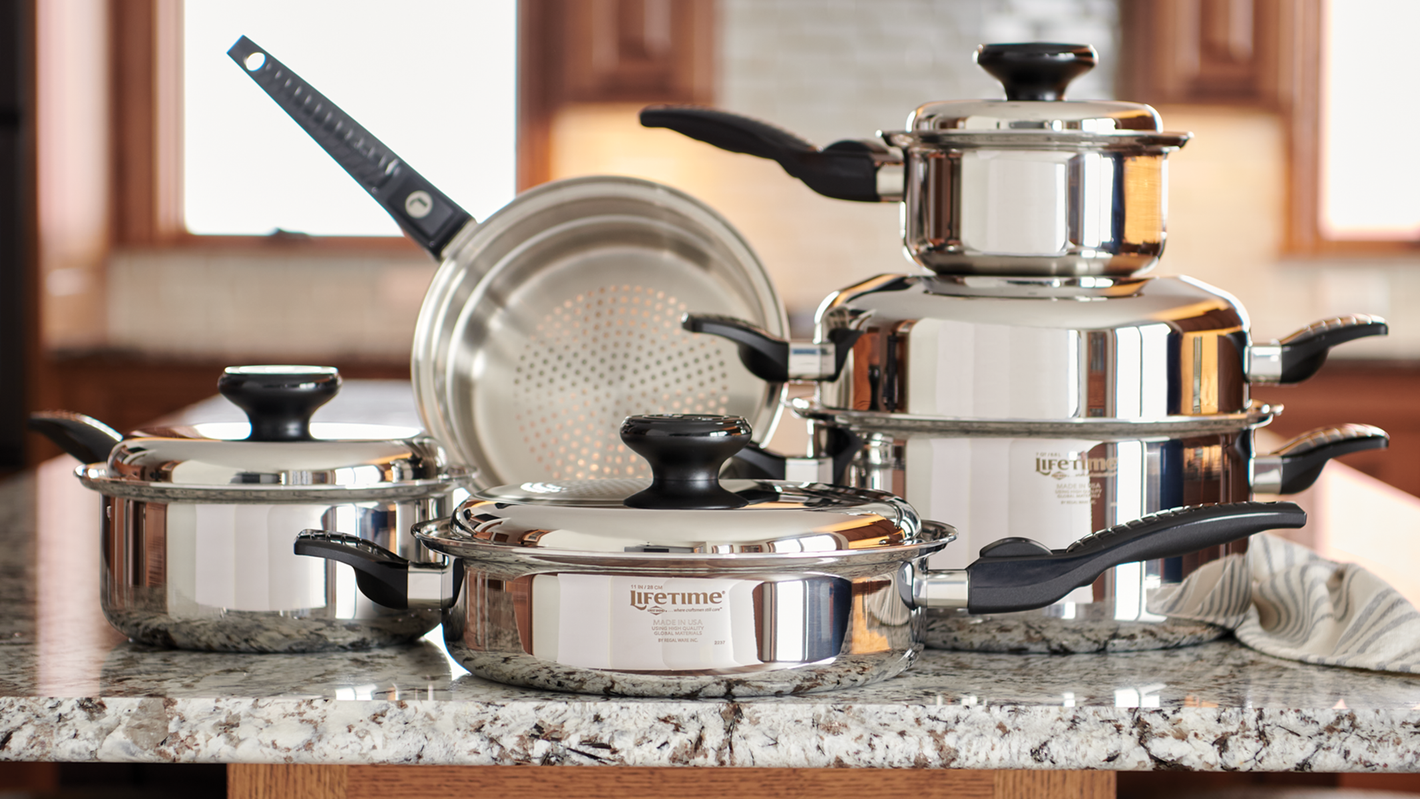 Five Lifetime Cookware Products on a Granite Countertop